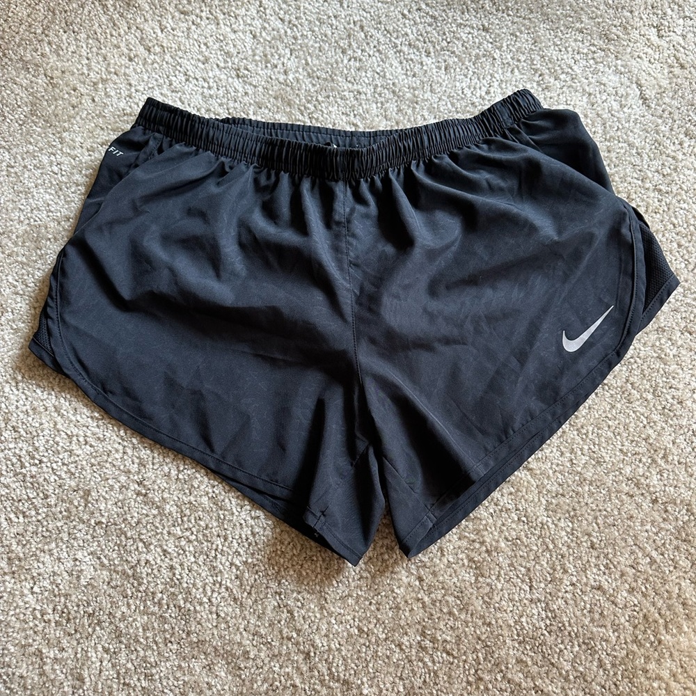 Black Nike Women’s running shorts. Size medium. Back pocket.